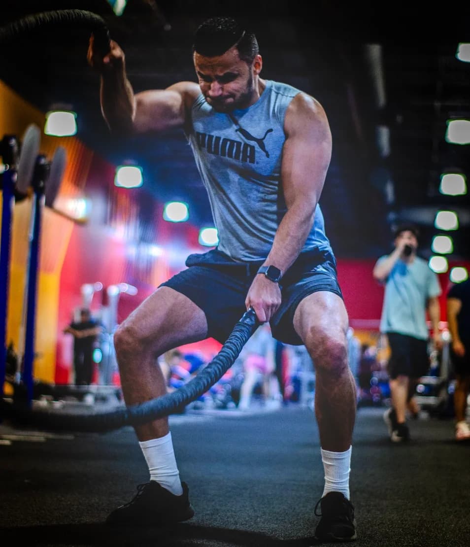 Naveed Lalzad training with battle ropes
